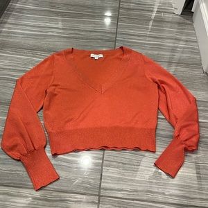 Intermix orange long sleeve deep v neck weather women’s size small, gold tinsel